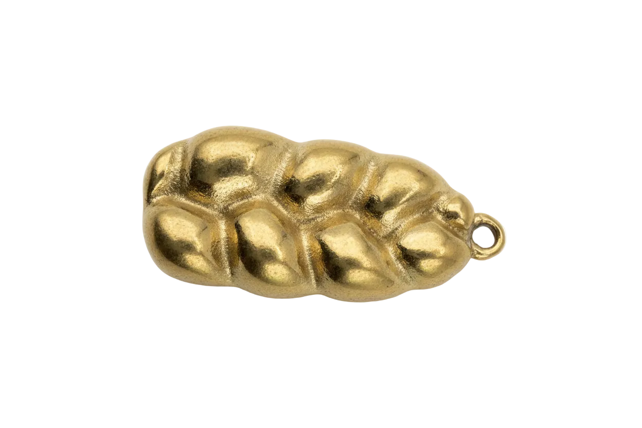 Gold-finish cluster charm with recessed green alien faces and black eyes