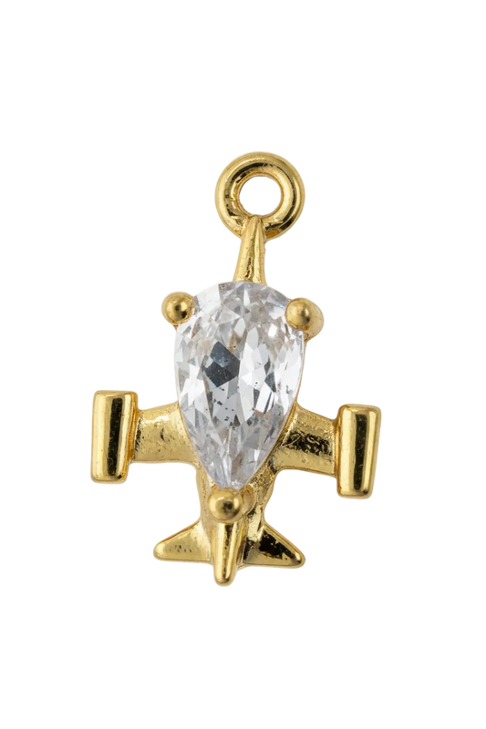 Gold airplane charm with a faceted clear oval gem centerpiece