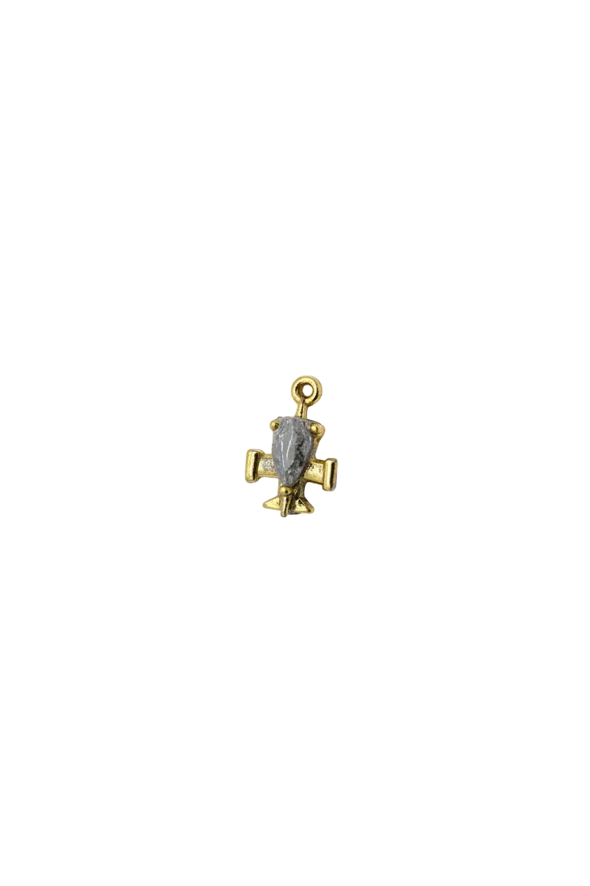 Gold airplane charm with clear oval gem