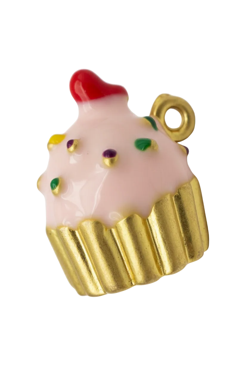 Gold cupcake with pink frosting, multicolor sprinkles, and red cherry top