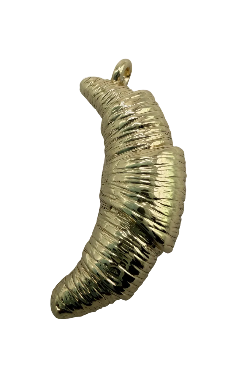 Textured gold croissant pastry charm with high-polish ridged finish