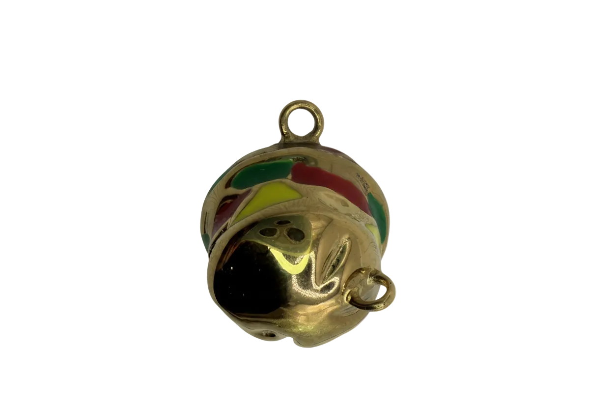 Gold jingle bell with red, green, and yellow enamel stripes and a small clear gem accent