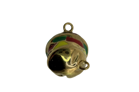 Gold jingle bell with red, green, and yellow enamel stripes and a small clear gem accent