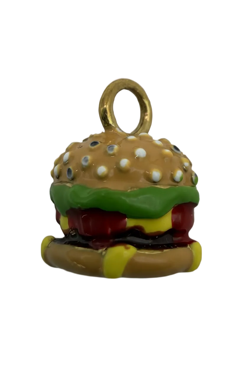 Glossy sesame bun cheeseburger charm in gold with red, green, yellow, and white enamel details