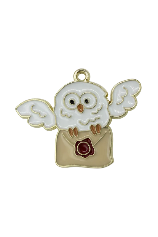 Glossy white rabbit figure in beige coat holding a red rose, outlined in gold