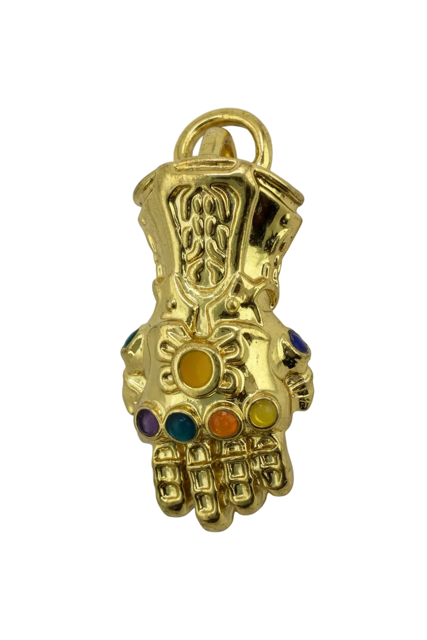 Gold gauntlet hand charm with multicolor gemstone accents on black background