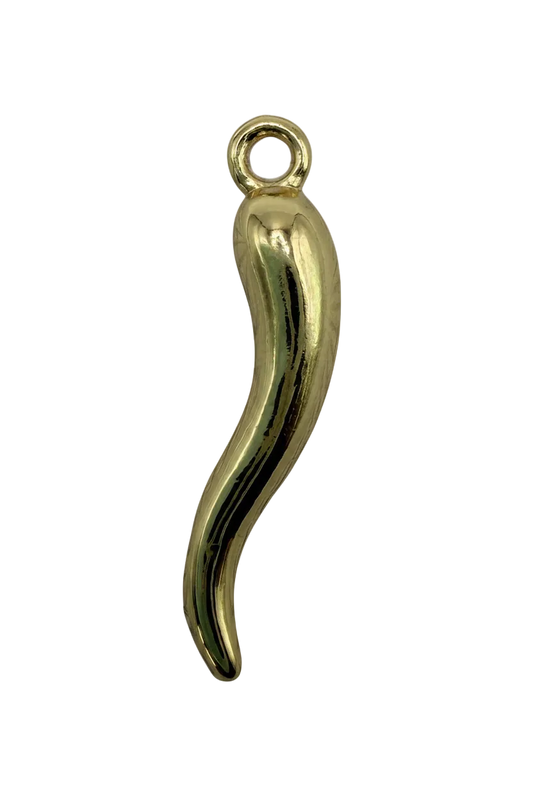 Polished gold curved chili pepper motif with smooth sculptural shine