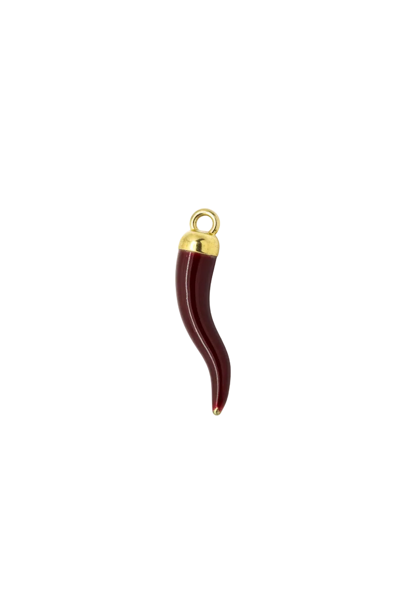 Glossy red horn with gold detail