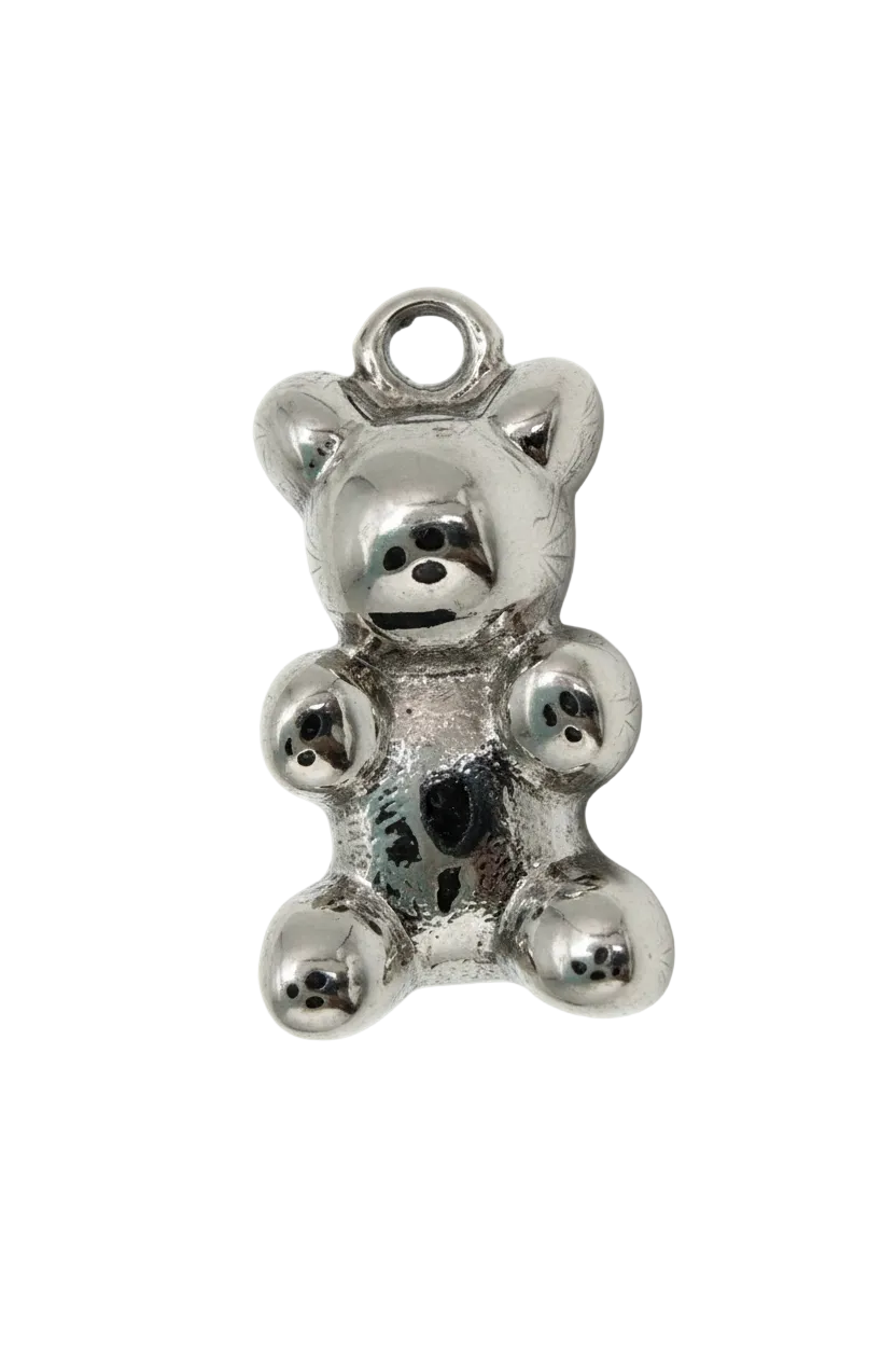 High-shine silver teddy bear with rounded paws and subtle black dot details
