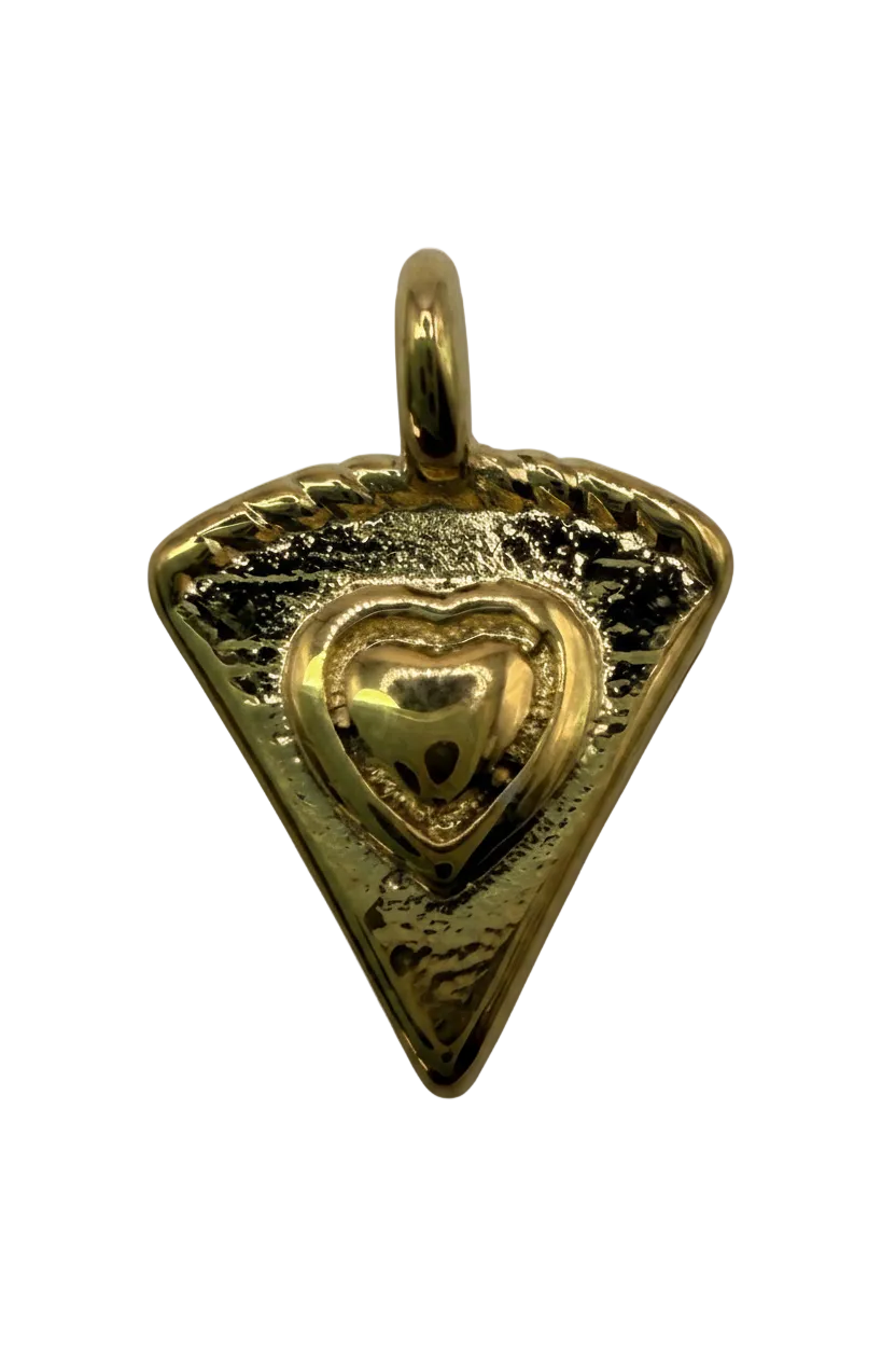 Gold triangle charm with raised heart detail and textured finish on black background