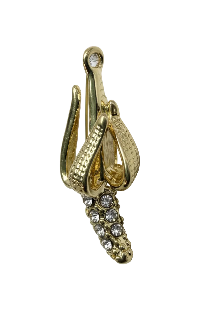 Polished gold bow with clear pavé crystals and a single clear crystal tip