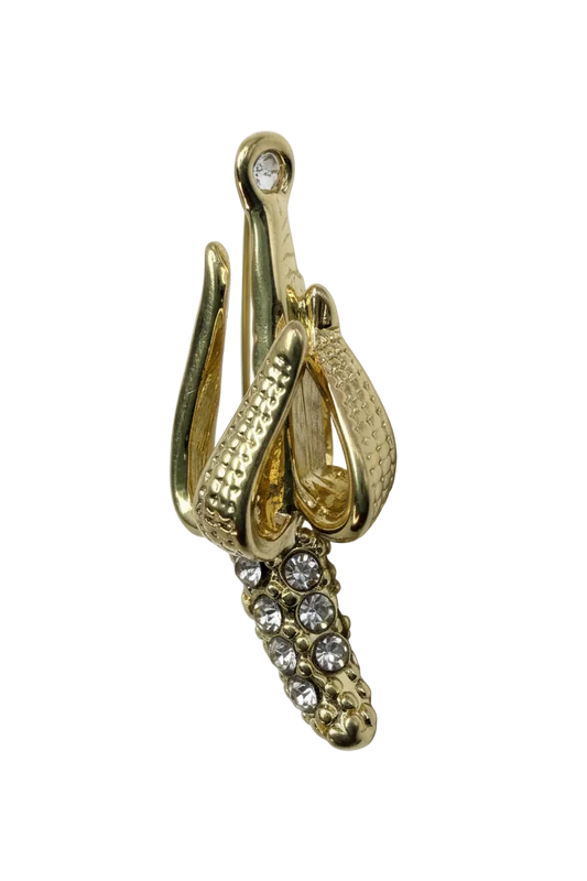 Polished gold bow with clear pavé crystals and a single clear crystal tip