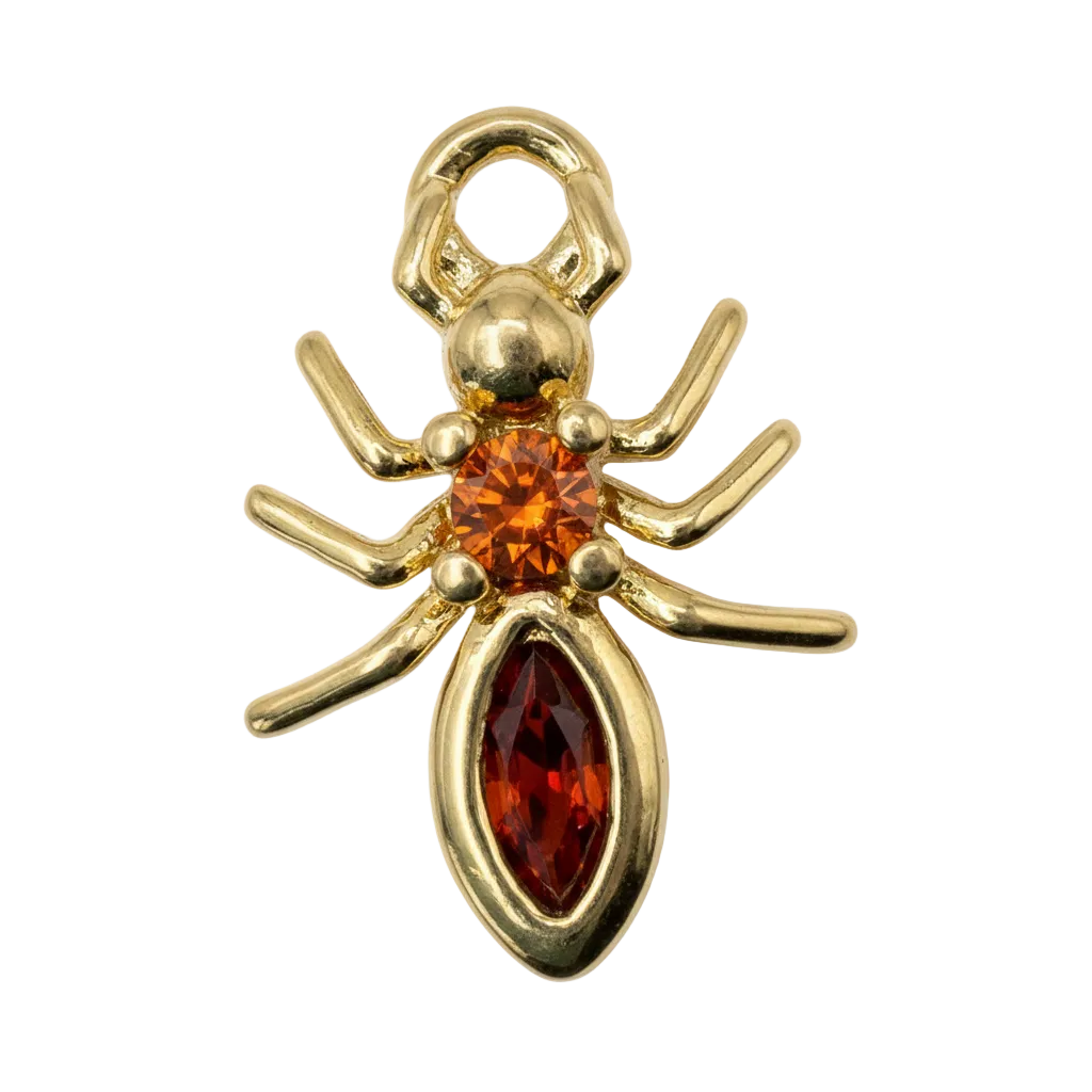 Gold spider charm with orange faceted gem center and deep red marquise gem body