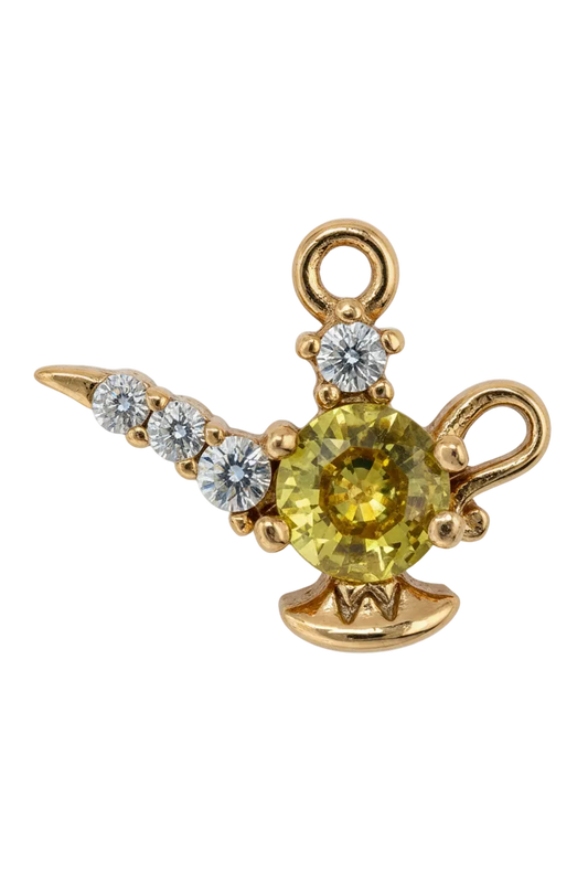 Gold unicorn head charm with faceted yellow gem and clear crystal accents on the horn