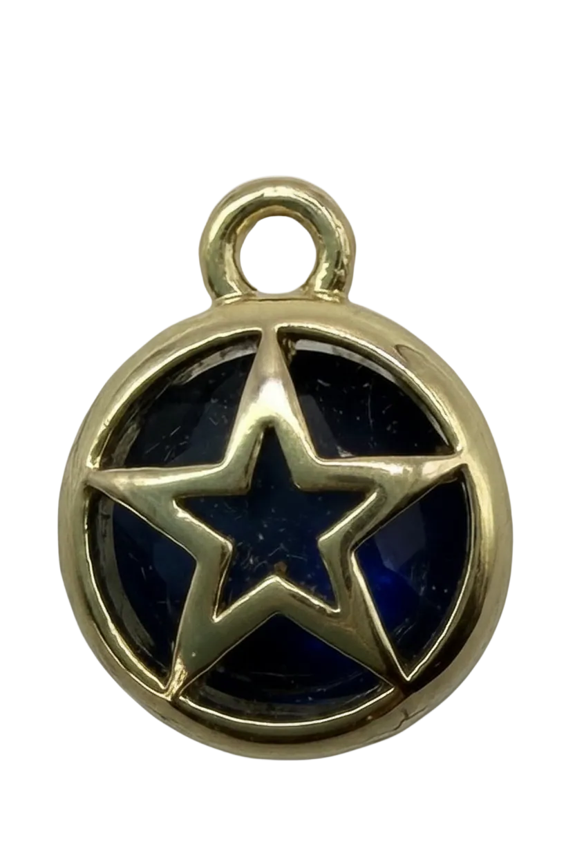 Round gold star medallion with glossy midnight-blue inlay