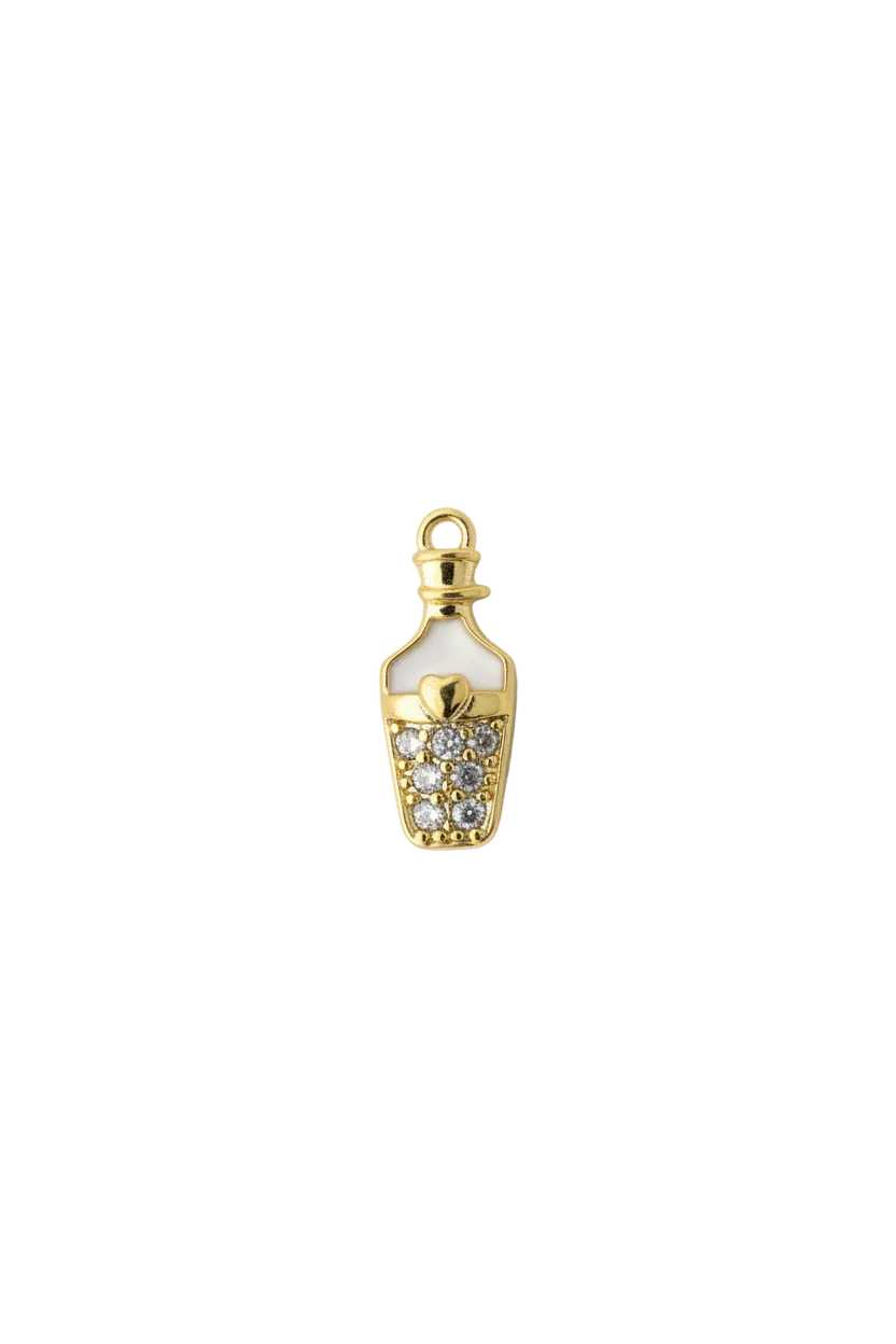 Gold baby bottle with clear pav  gems and white enamel