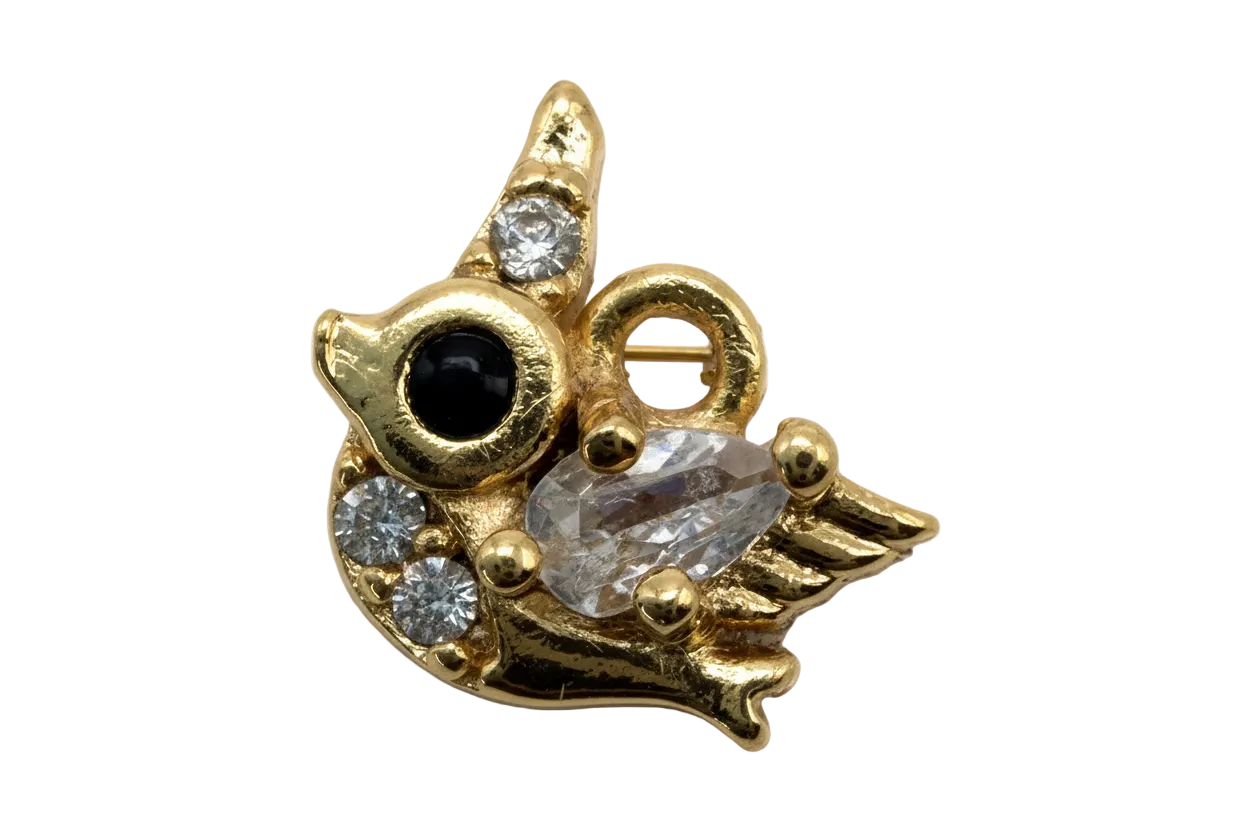 Gold owl charm with clear crystal eyes and faceted clear stone wing