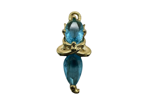 Gold bow charm with two faceted aqua blue gemstones in oval and marquise cuts