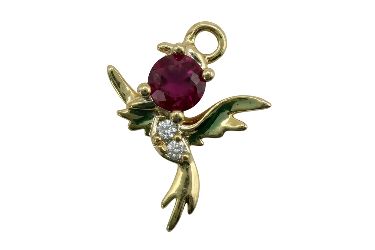Gold hummingbird charm with faceted ruby-red oval gem and two clear accent gems