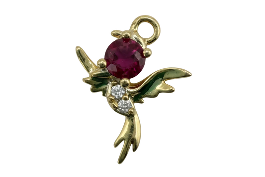 Gold hummingbird charm with faceted ruby-red oval gem and two clear accent gems