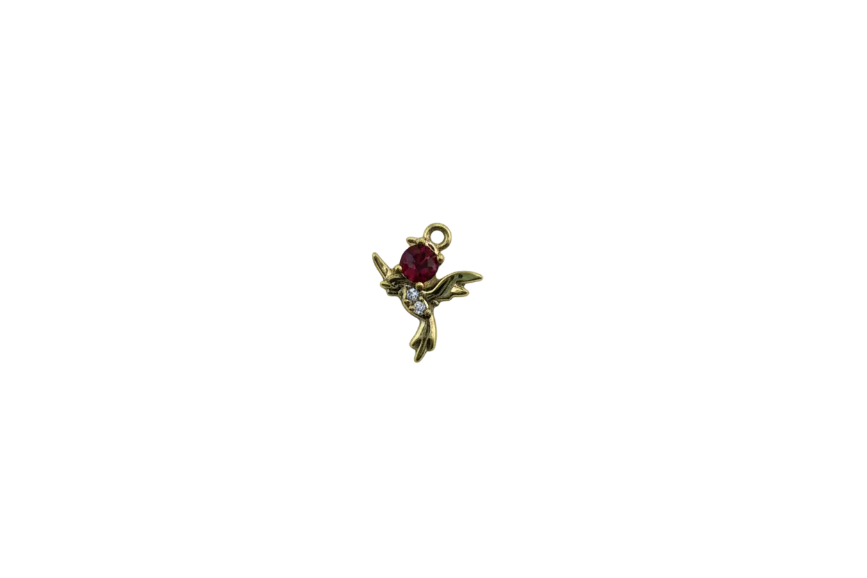 Gold hummingbird with ruby-red oval gem and clear accents
