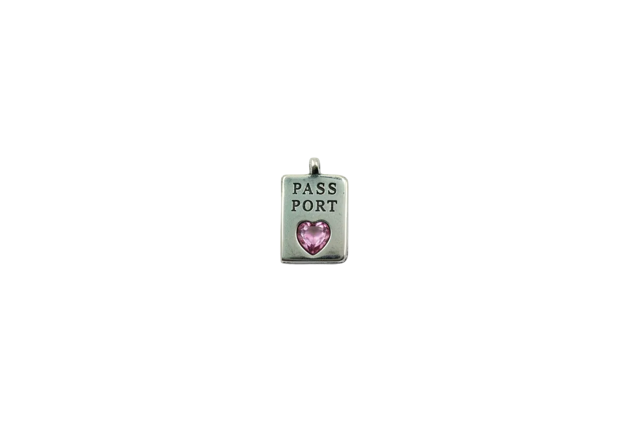 Silver passport plate with pink heart gem