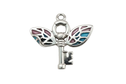 Polished silver key with stained-glass butterfly wings in teal, navy, and plum enamel