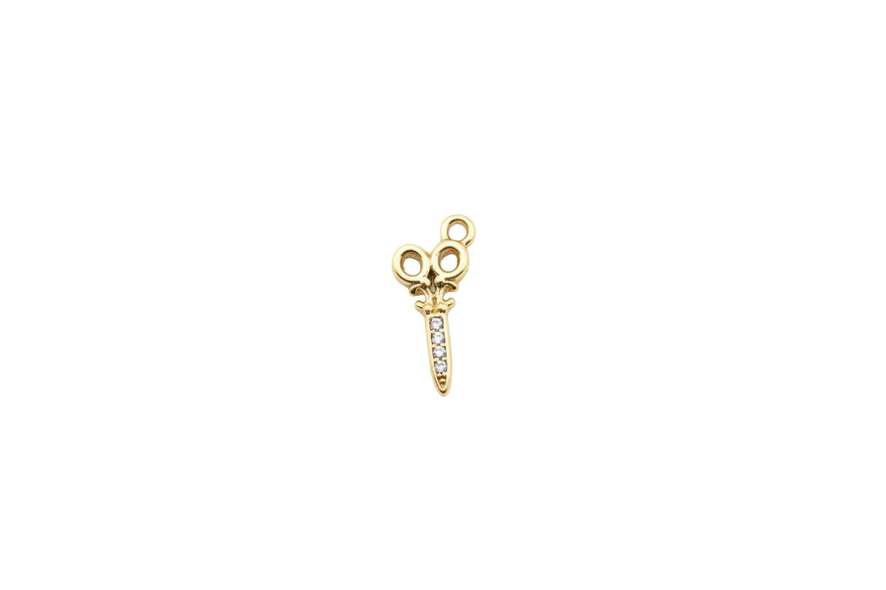 Gold scissors motif with clear crystal gems