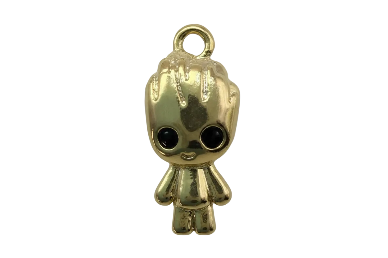 Glossy gold cute figure with dripping icing detail and oversized black eyes