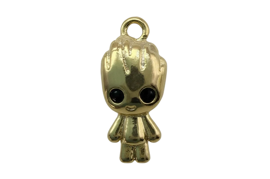 Glossy gold cute figure with dripping icing detail and oversized black eyes
