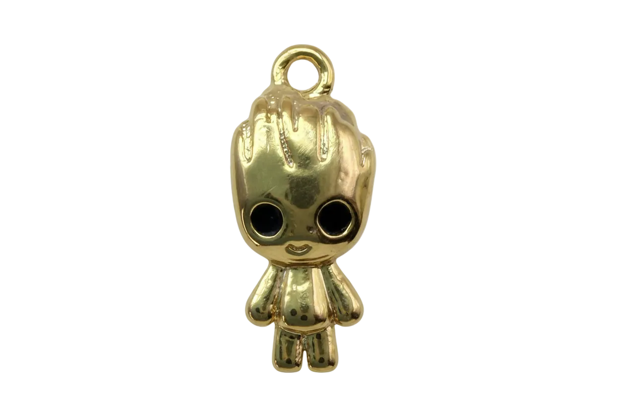 High-polish gold doll figure with oversized black eyes and textured hair