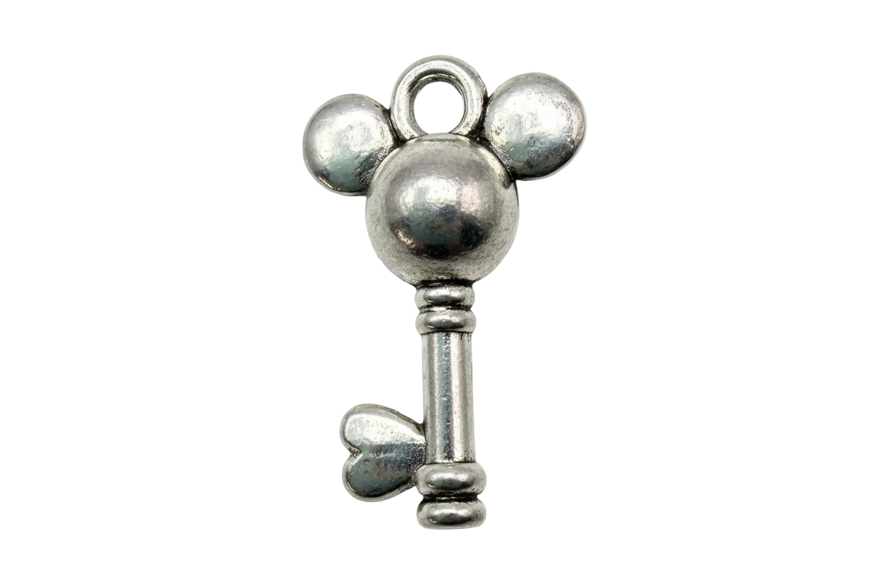 Polished silver key with rounded three-orb top and heart-shaped bit