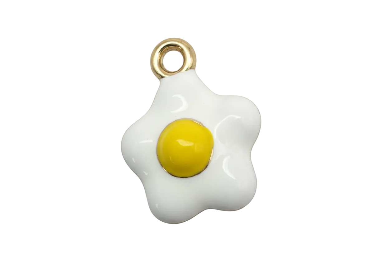 Glossy white fried egg charm with yellow yolk and gold accents