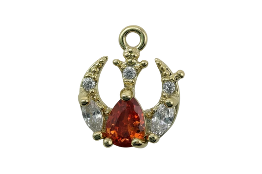 Gold crown motif with pear-cut burnt orange gem and clear crystals