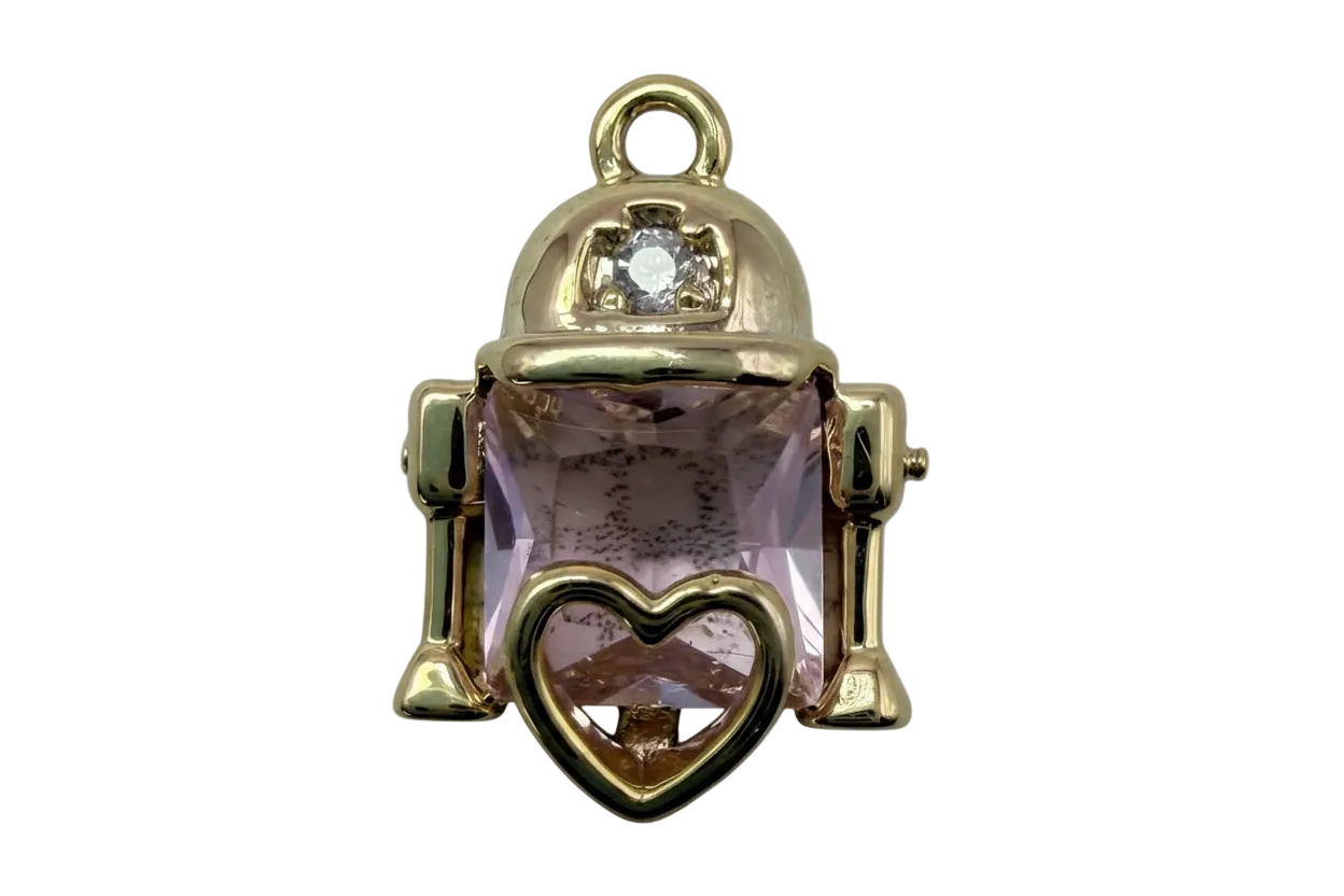 Gold robot charm with faceted lavender rectangular gem, heart detail, and small clear gem accent