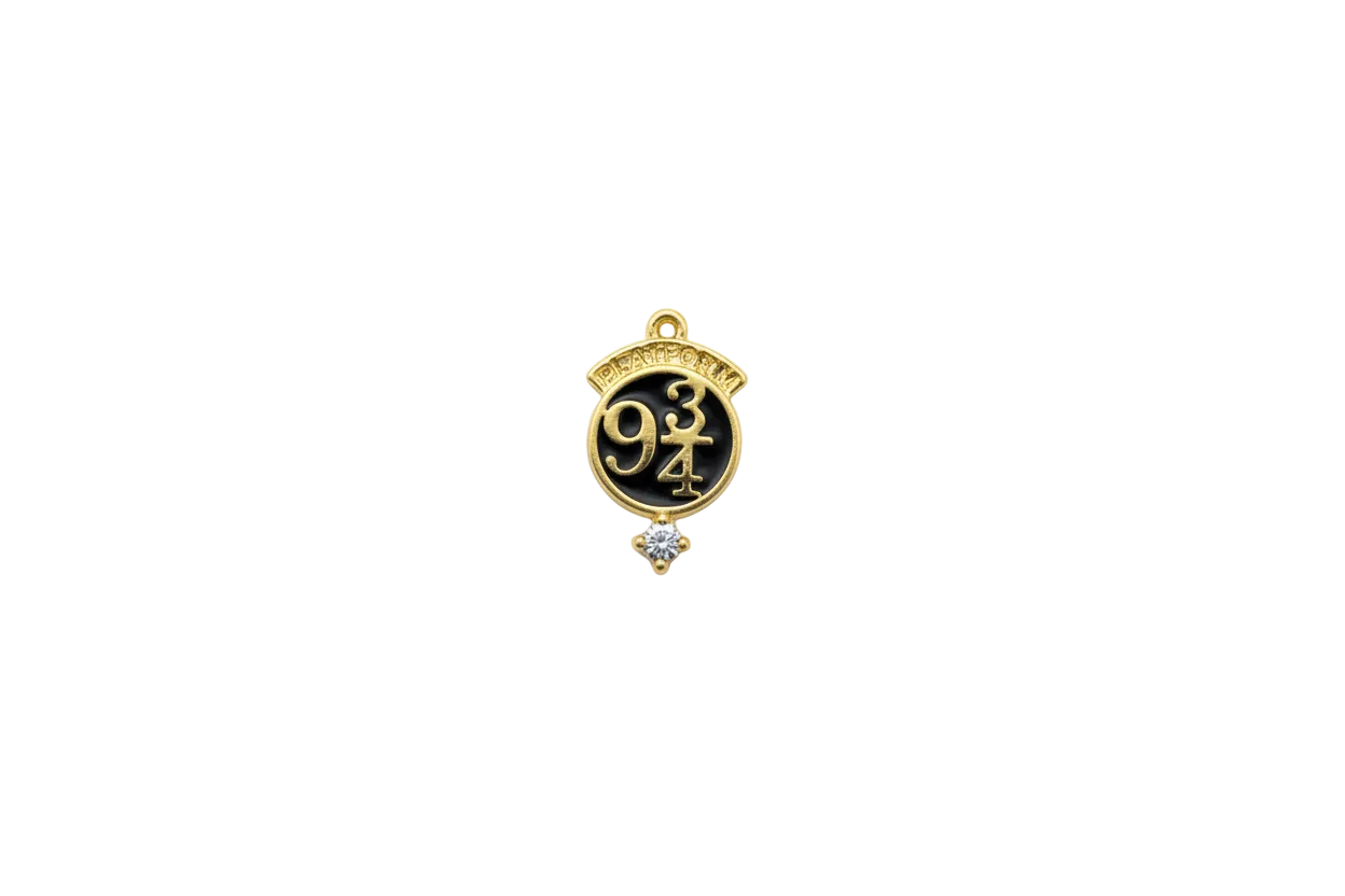 Gold medallion with black enamel “9 3/4” and clear crystal