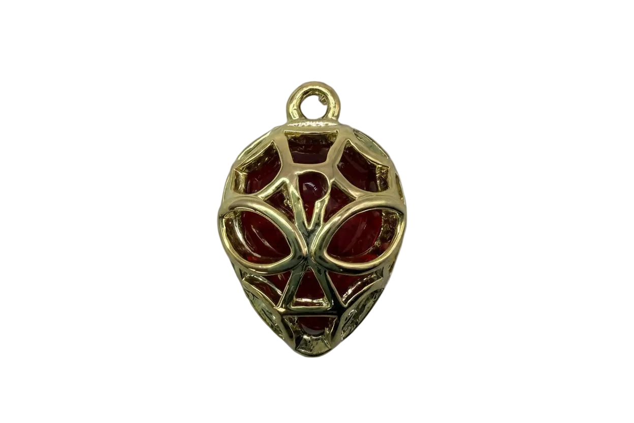 Gold webbed superhero mask with glossy deep red inlay