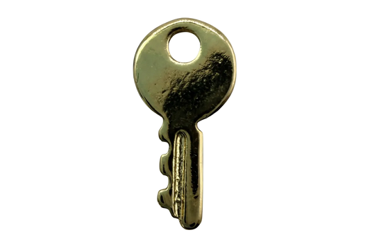 Polished gold key charm with a small round white marbled gem accent