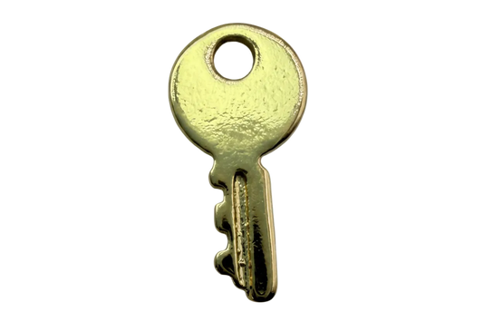 Glossy gold key silhouette with rounded head and notched edge