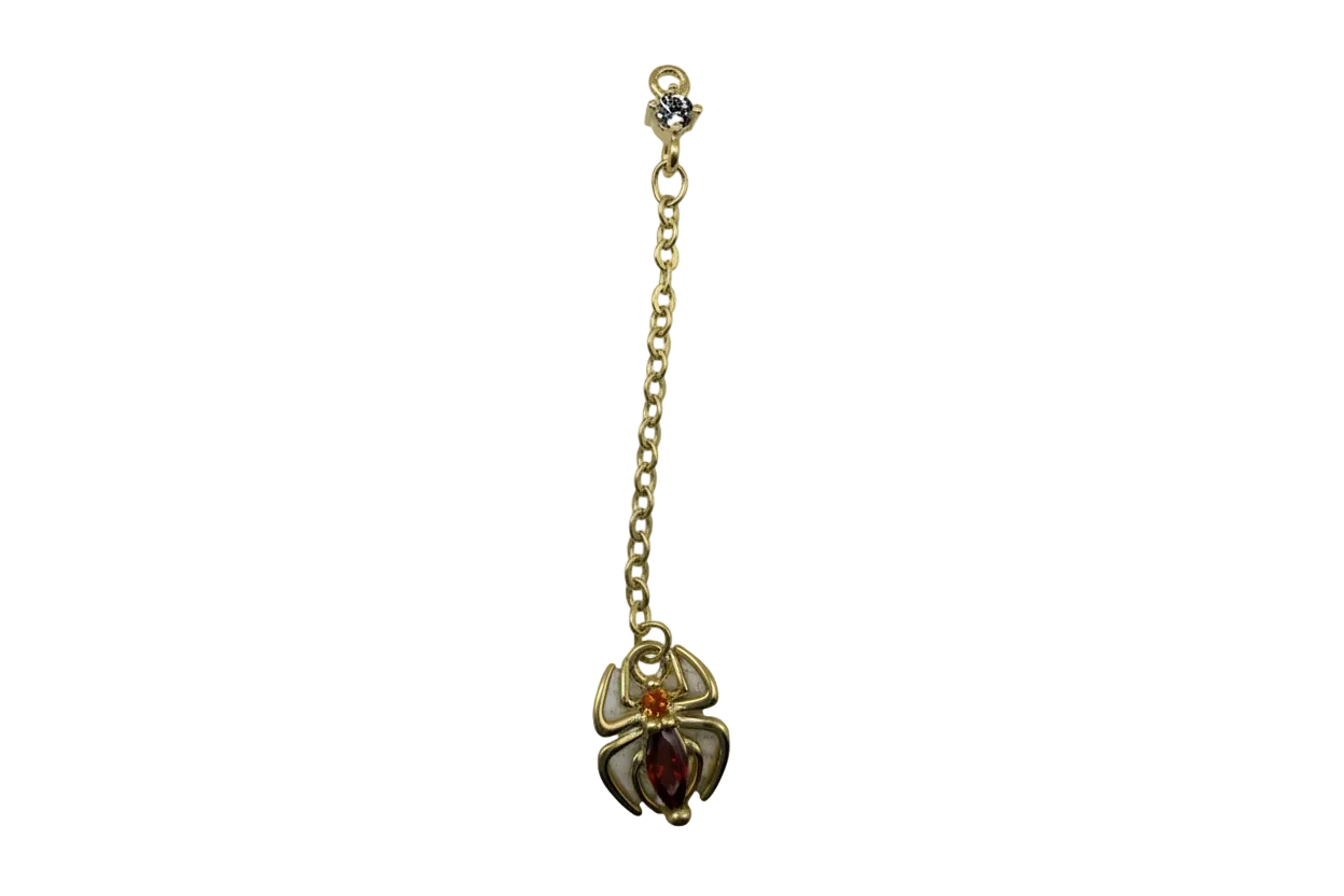 Gold scarab beetle with red marquise gem and small amber crystal, suspended from a gold chain