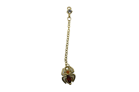 Gold scarab beetle with red marquise gem and small amber crystal, suspended from a gold chain