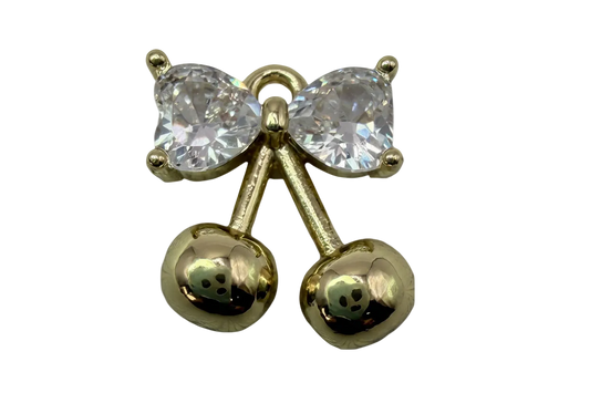 Polished gold cherry pair with clear faceted crystal bow