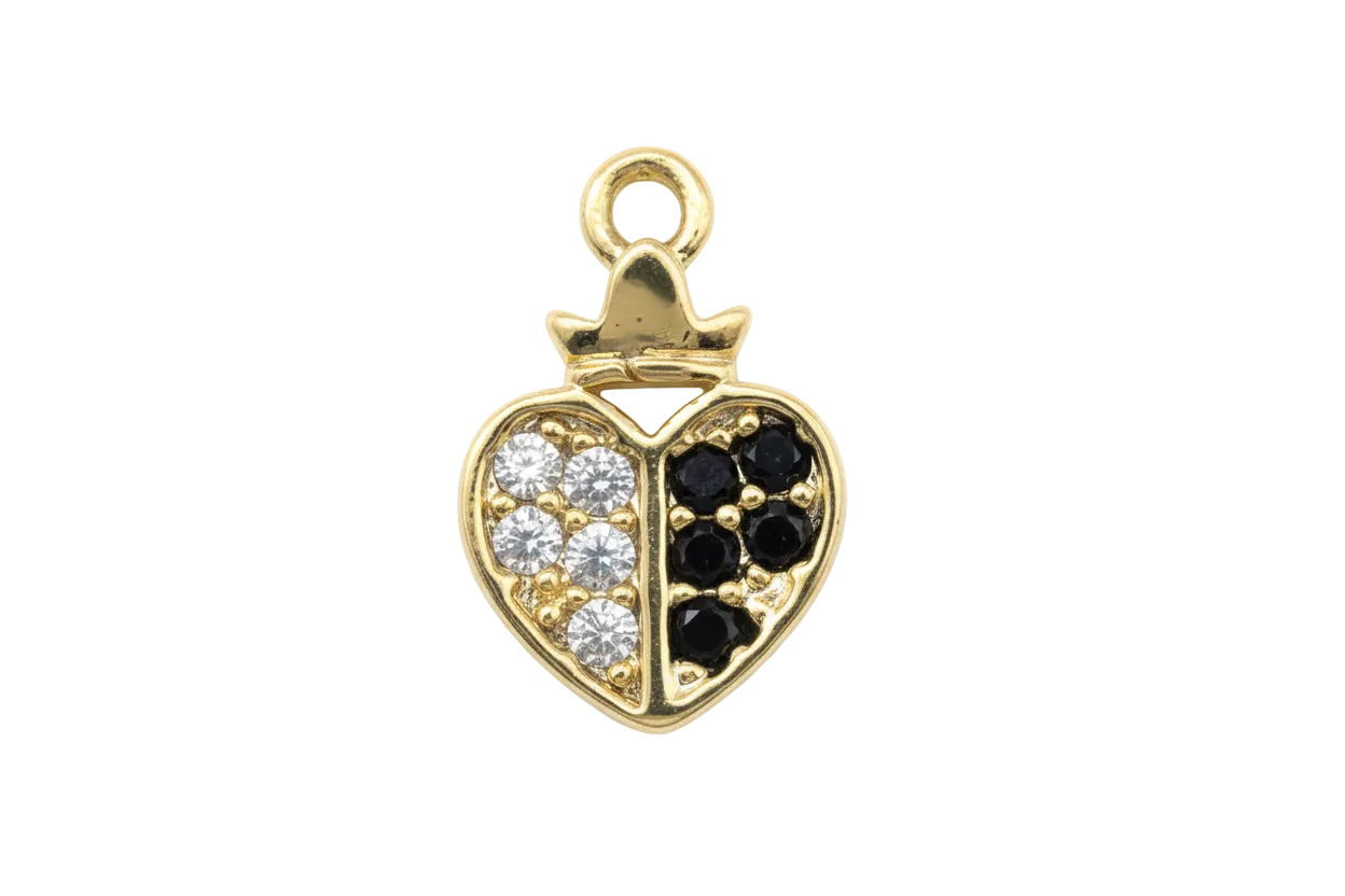 Gold split heart charm with clear pavé stones on one side and black stones on the other