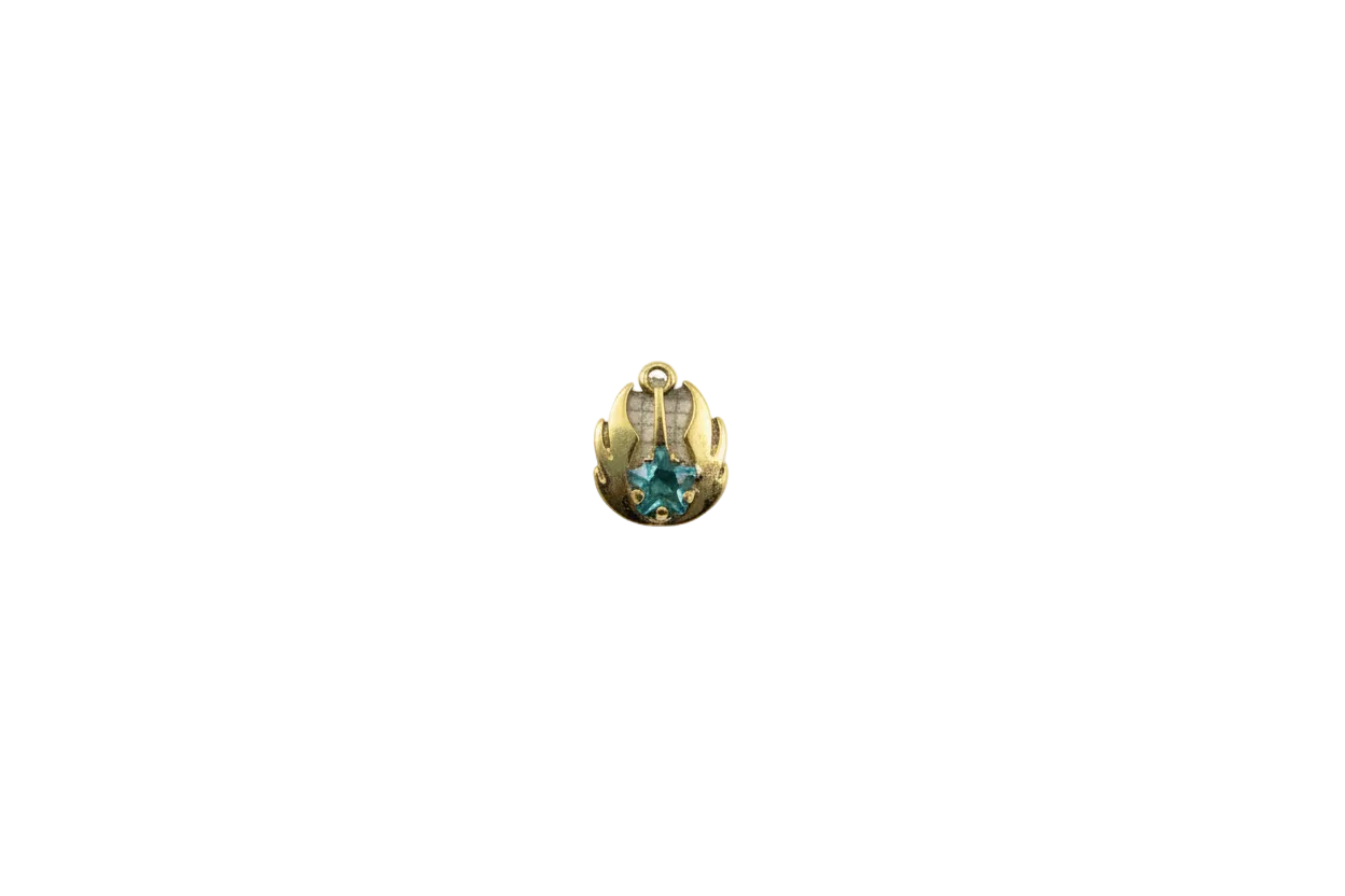 Gold anchor medallion with aqua star gem