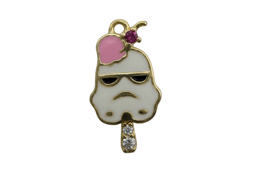 Gold-tone popsicle face with white enamel, black sunglasses, pink heart, purple gem, and two clear crystals