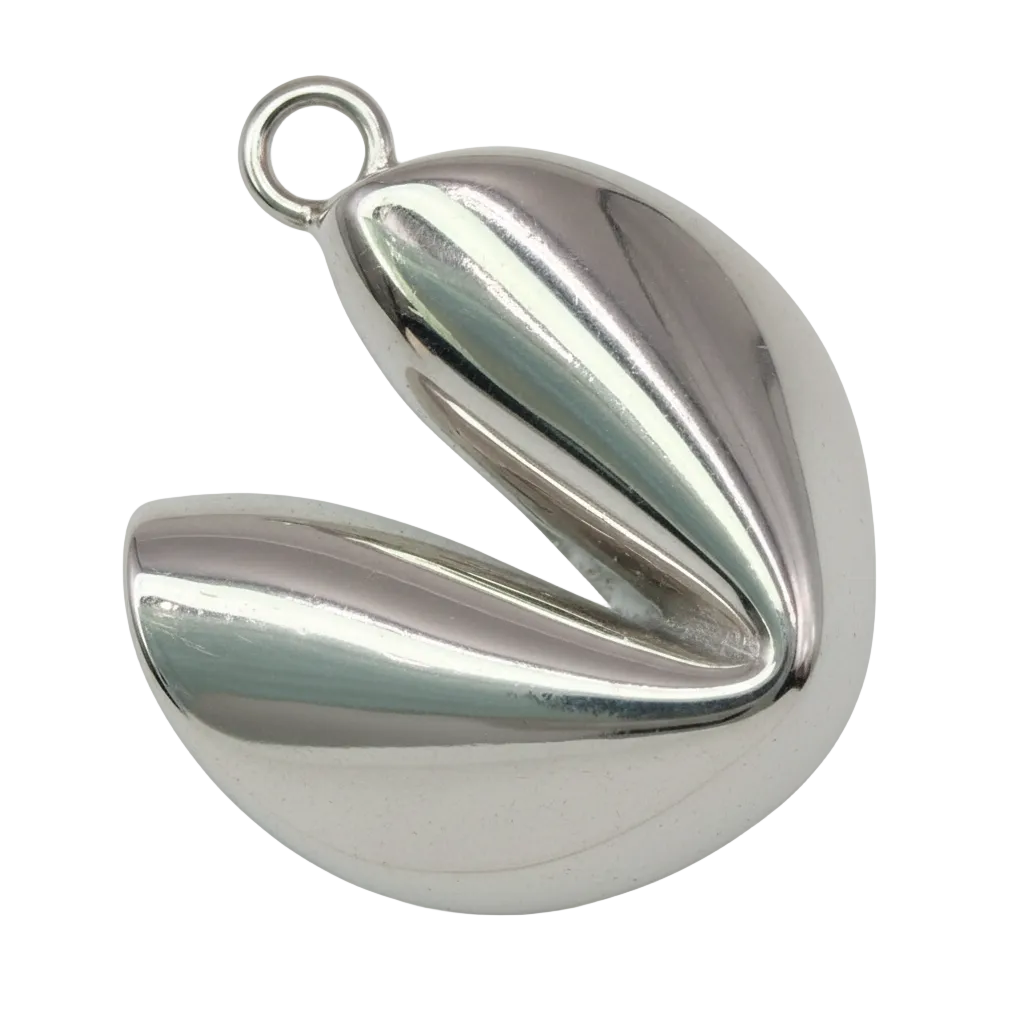 Mirror-polished silver puff heart with a folded sculptural shape