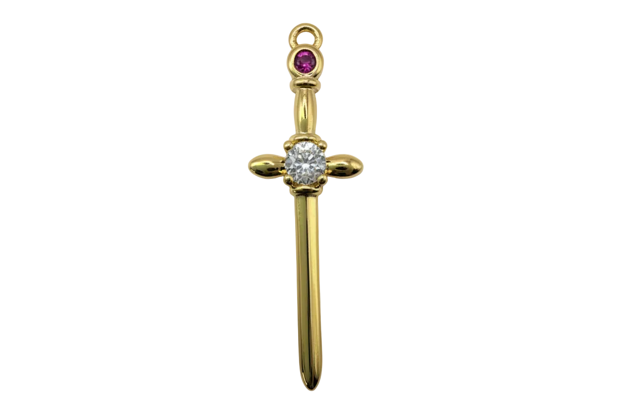 Gold sword charm with clear faceted round gem and purple accent stone