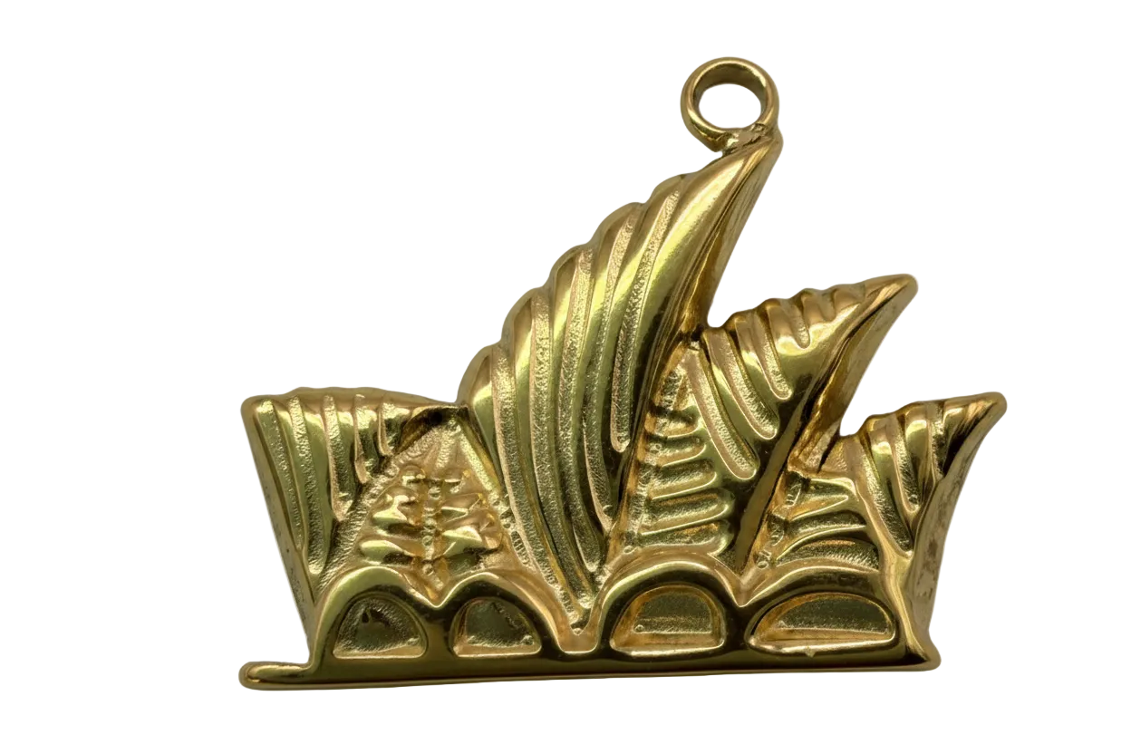 Gold sculpted leaf fan charm with ridged texture and polished finish