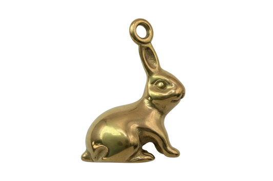 High-polish gold sitting rabbit figure with smooth sculpted details