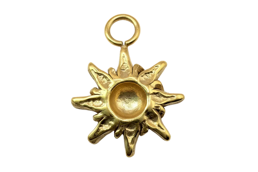 Glossy gold sunburst medallion with domed center and sculpted rays